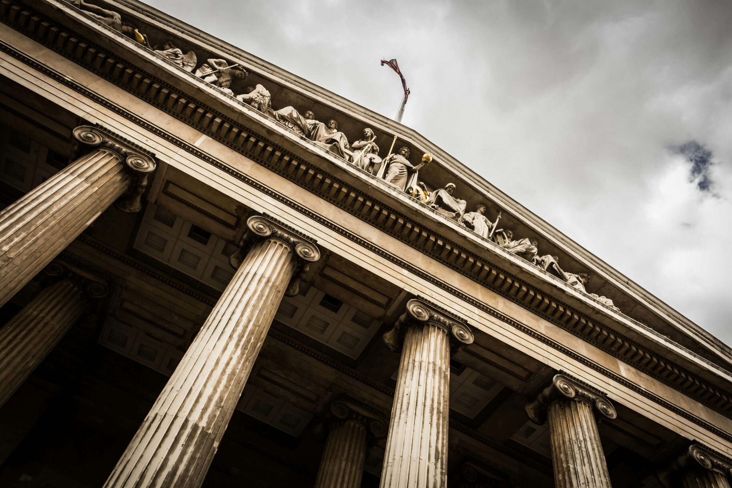 Woman attorney experiencing BigLaw burnout while working late in a New York City office